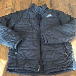 North face down filled -boys medium 10/12 reversible jacket. Zip pockets